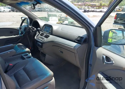 2010 Honda Odyssey Touring z USA, uszkodzony, nr VIN 5FNRL3H93AB058240